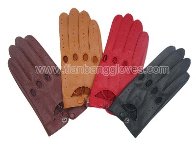 Perforated leather driving glove with knuckle holes and snap closure at wrist