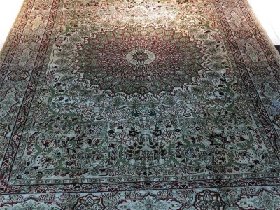The manufacturer of high-quality handmade silk carpet is Yamei Carpet Factory