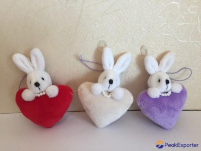 plush rabbit head with heart