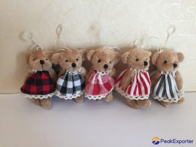 lovely plush bear with skirt hanging