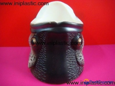 we mainly manufacture golden fish head can holder toy milk cow figurine