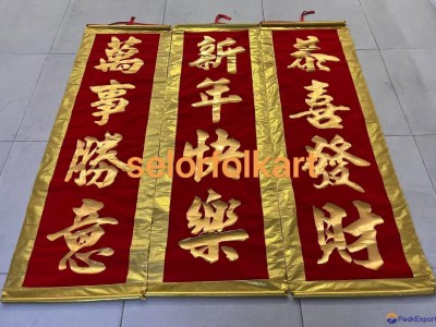Hand-sewed scrolls for lion dance