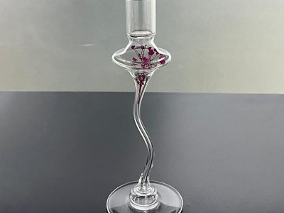 Glass candlesticks with dried flower